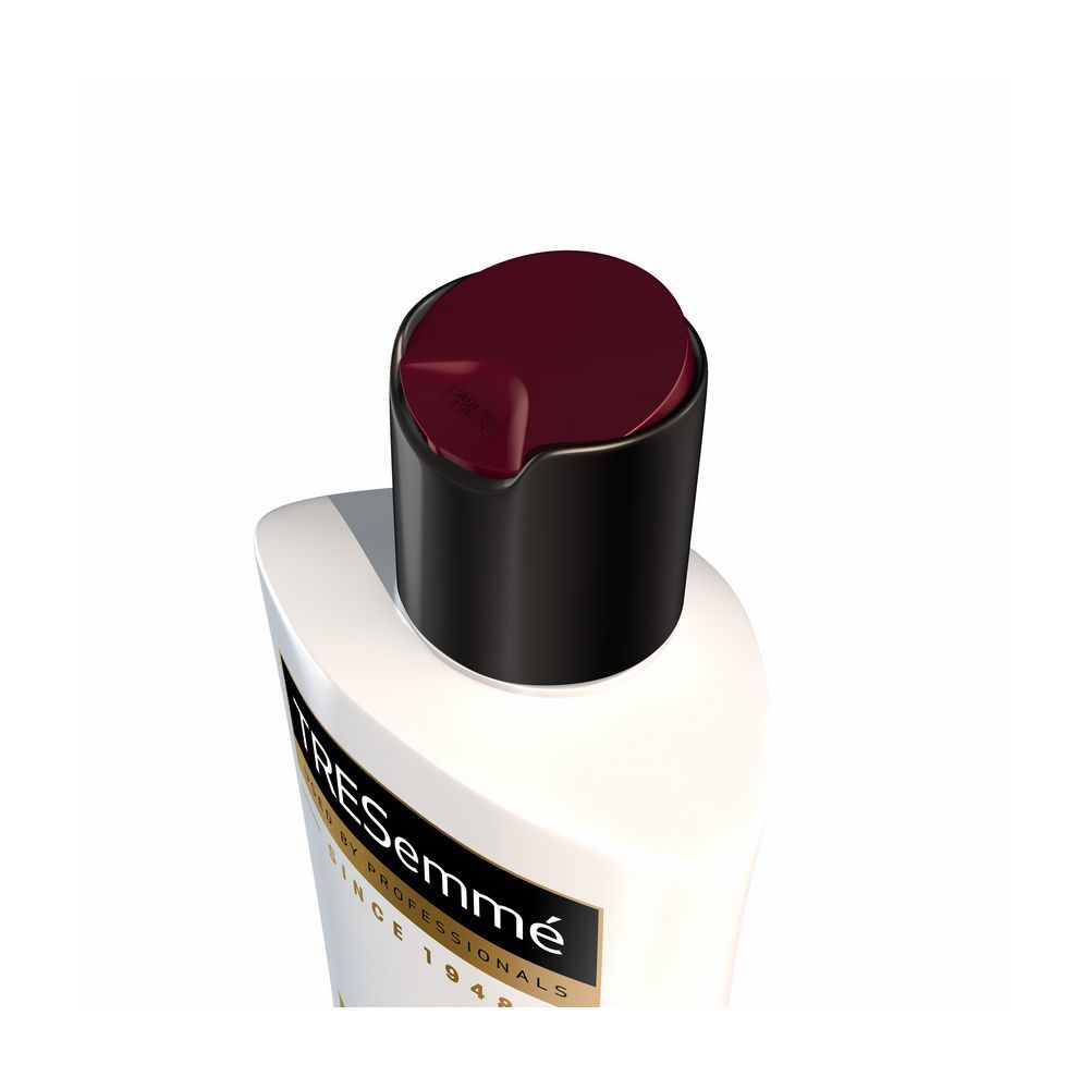 Разглаживающий кондиционер для волос Тресемме Keratin Smooth с кератином и маслом марулы 400мл. Фото 2.
